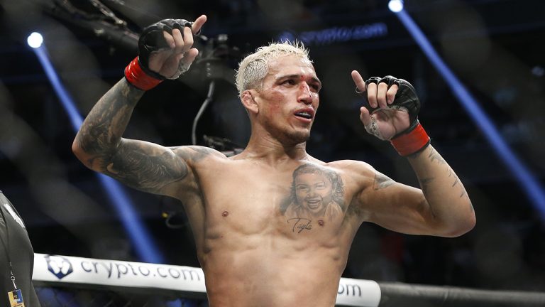 UFC fighter Charles Oliveira celebrating. (Chase Stevens/AP)