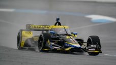 Herta makes all right moves to win wet, wild IndyCar GP