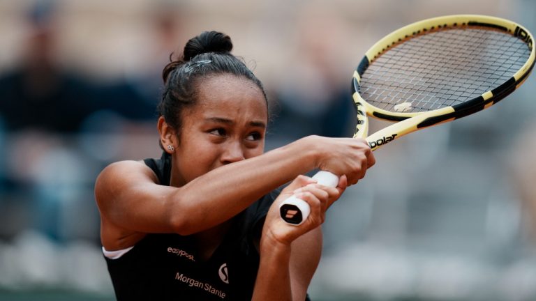 Canada's Leylah Fernandez plays a shot against Italy's Martina Trevisan during their quarterfinal match at the French Open tennis tournament in Roland Garros stadium in Paris, France, Tuesday, May 31, 2022. (Thibault Camus/AP Photo)