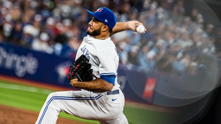 Toronto Blue Jays relief pitcher Yimi Garcia throws the ball during the eighth inning of the home opener AL MLB baseball action against the Texas Rangers, in Toronto on Friday, April 8, 2022. (CP/file)