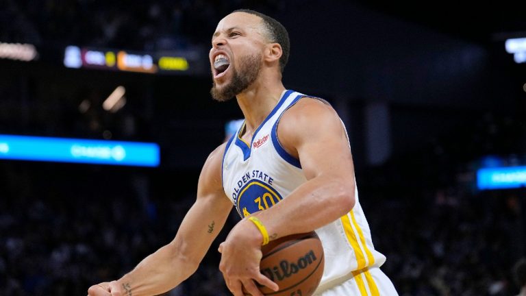 Golden State Warriors guard Stephen Curry (30) celebrate in the final minute against the Memphis Grizzlies during the second half of Game 4 of an NBA basketball Western Conference playoff semifinal in San Francisco, Monday, May 9, 2022. Warriors won 101-98. (Tony Avelar/AP)