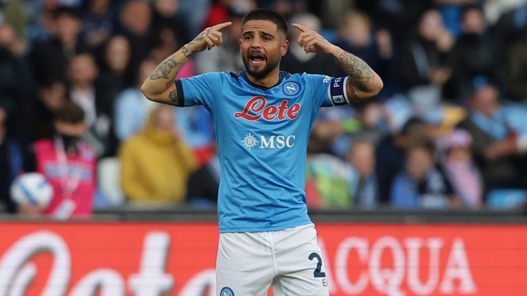 Napoli's Lorenzo Insigne celebrates scoring his side's opening goal during the Serie A soccer match between Napoli and Roma, at the Diego Armando Maradona stadium in Naples, Monday, April 18, 2022. (Alessandro Garofalo/LaPresse via AP)