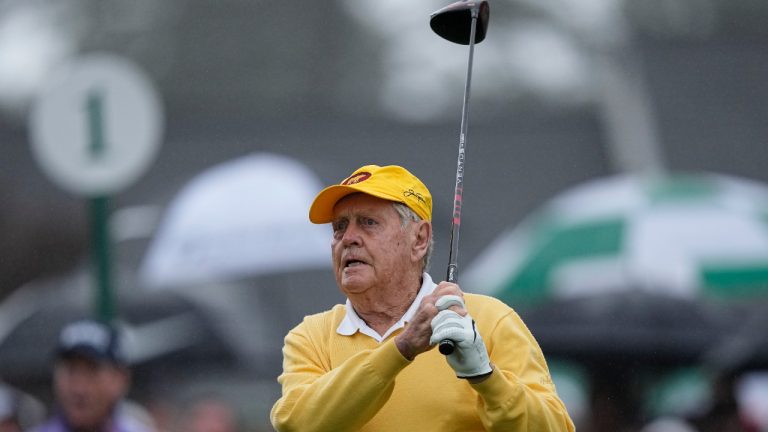 Jack Nicklaus hits his tee shot during the honorary starter ceremony before the first round at the Masters golf tournament on Thursday, April 7, 2022, in Augusta, Ga. (David J. Phillip/AP)