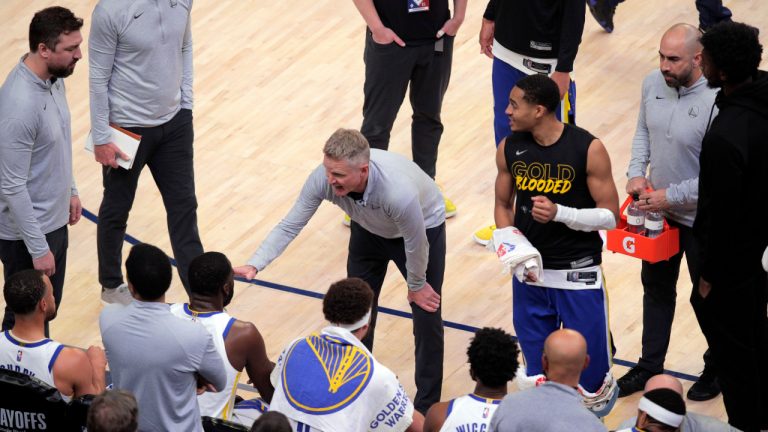 Golden State Warriors coach Steve Kerr talks to the team as a flagrant-2 foul is reviewed during the first quarter of Game 2 of the team's NBA basketball second-round playoff series against the Memphis Grizzlies in Memphis, Tenn., Tuesday, May 3, 2022. (Carlos Avila Gonzalez/San Francisco Chronicle via AP)