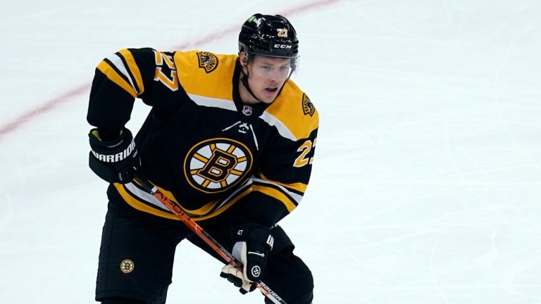 Boston Bruins defenceman Hampus Lindholm (27) looks for a pass during the first period of an NHL hockey game against the Tampa Bay Lightning, Thursday, March 24, 2022, in Boston. (Charles Krupa/AP Photo)