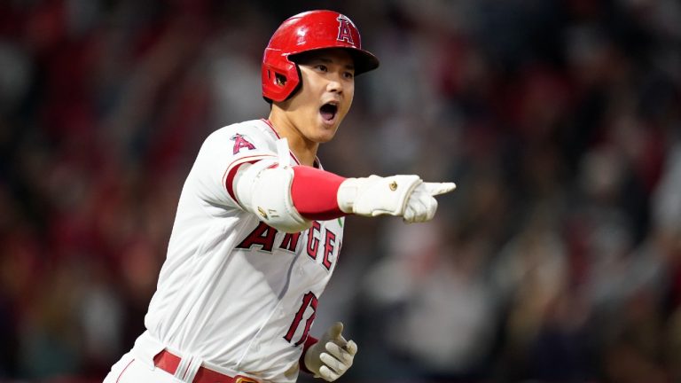 Los Angeles Angels designated hitter Shohei Ohtani (17) reacts as he runs the bases after hitting a grand slam home run during the seventh inning of a baseball game against the Tampa Bay Rays in Anaheim, Calif., Monday, May 9, 2022. Andrew Velazquez, Brandon Marsh, and Mike Trout also scored. (Ashley Landis/AP)