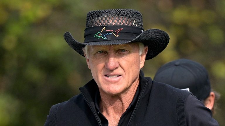 Greg Norman walks on the first hole after hitting his tee shot during the final round of the PNC Championship golf tournament, Sunday, Dec. 20, 2020, in Orlando, Fla. (AP Photo/Phelan M. Ebenhack, File)