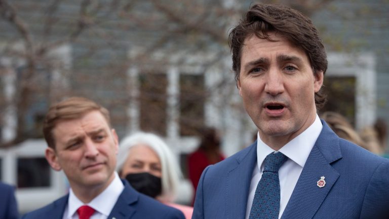 Prime Minister Justin Trudeau, seen here on Tuesday with Newfoundland Premier Andrew Furey in St. John’s, criticized Canada Soccer's decision to host Iran for a friendly game in Vancouver this summer. (Paul Daly/CP)