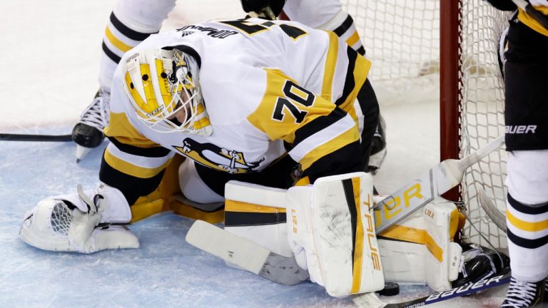 Pittsburgh Penguins goaltender Louis Domingue makes a save against the New York Rangers during the second overtime of Game 1 of an NHL hockey Stanley Cup first-round playoff series Tuesday, May 3, 2022, in New York. (Adam Hunger/AP)