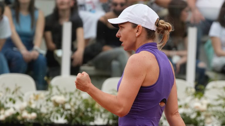 Romania's Simona Halep celebrates after winning a point during her match against France's Alize Cornet at the Italian Open tennis tournament, in Rome, Monday, May 9, 2022. (Gregorio Borgia/AP)