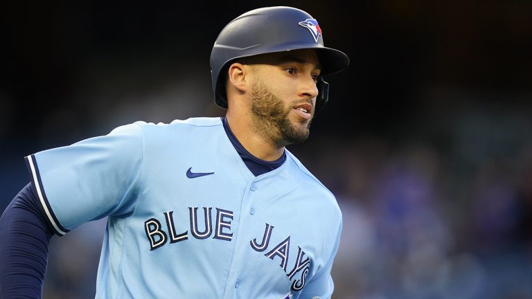 Toronto Blue Jays' George Springer runs the bases after hitting a home run during the first inning of a baseball game against the New York Yankees. (Frank Franklin II/AP)