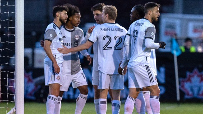 Toronto FC teammates react after scoring the winning goal off HFX Wanderers defender Peter Schaale during second half Canadian Championship soccer quarterfinal action at Wanderers Ground in Halifax on Tuesday, May 24, 2022. Toronto won 2-1. (Andrew Vaughan/CP)