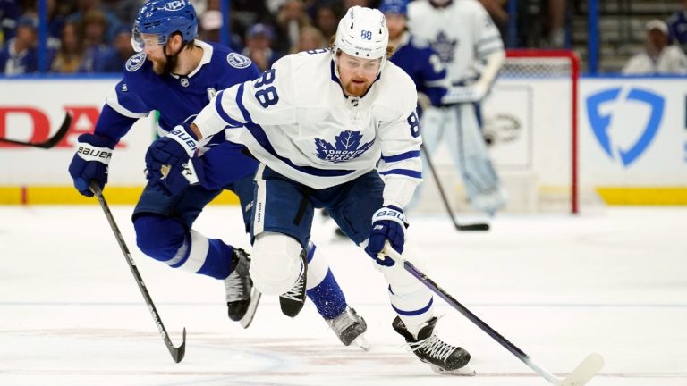 Toronto Maple Leafs right wing William Nylander (88) breaks out ahead of Tampa Bay Lightning defenseman Victor Hedman (77) during the first period in Game 6 of an NHL hockey first-round playoff series Thursday, May 12, 2022, in Tampa, Fla. (Chris O'Meara/AP)