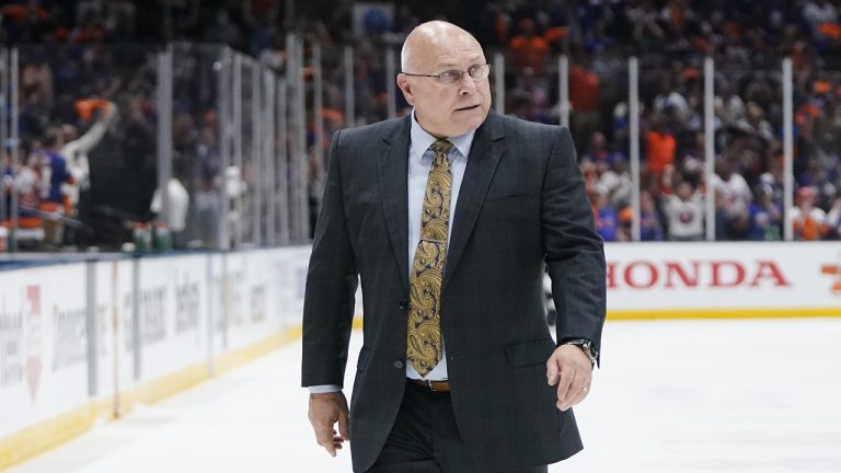 Former New York Islanders coach Barry Trotz leaves the ice. (Frank Franklin II/AP)