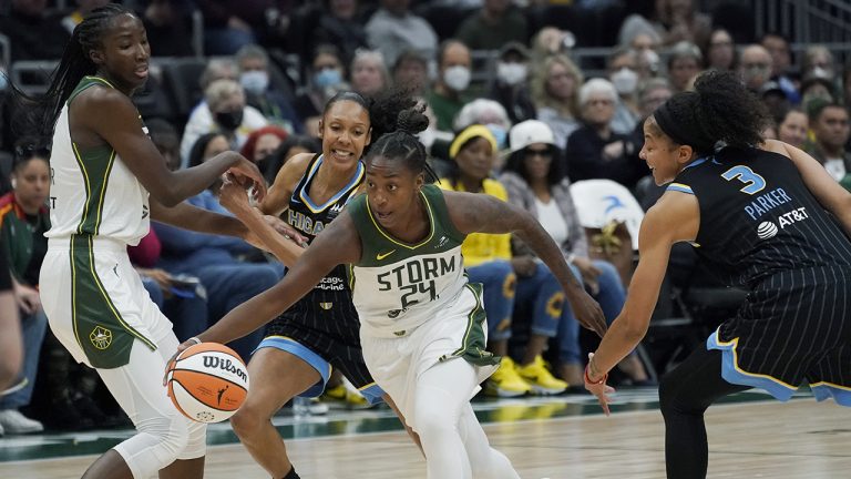 Seattle Storm guard Jewell Loyd (24) drives to the basket past Chicago Sky forward Candace Parker (3) during the first half of a WNBA basketball game Wednesday, May 18, 2022, in Seattle. (Ted S. Warren/AP)