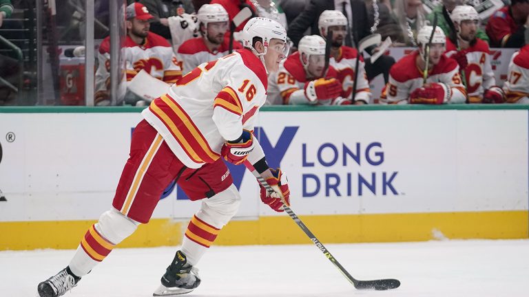 Calgary Flames defenceman Nikita Zadorov skates with the puck against the Dallas Stars during the first period of Game 6 of an NHL hockey Stanley Cup first-round playoff series. (Tony Gutierrez/AP)