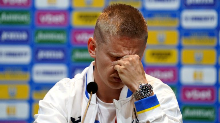 Ukraine's Oleksandr Zinchenko reacts, during a press conference, at Hampden Park, in Glasgow, Scotland, Tuesday May 31, 2022. Scotland will play Ukraine in a World Cup qualifier soccer match on Wednesday. (Andrew Milligan/PA via AP)