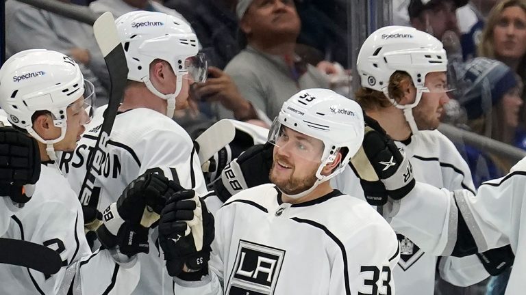 Los Angeles Kings right wing Viktor Arvidsson (33) celebrates his goal against the Tampa Bay Lightning with the bench during the second period of an NHL hockey game Tuesday, Dec. 14, 2021, in Tampa, Fla. Los Angeles Kings right wing Viktor Arvidsson (33) celebrates his goal against the Tampa Bay Lightning with the bench during the second period of an NHL hockey game. (Chris O'Meara/AP)