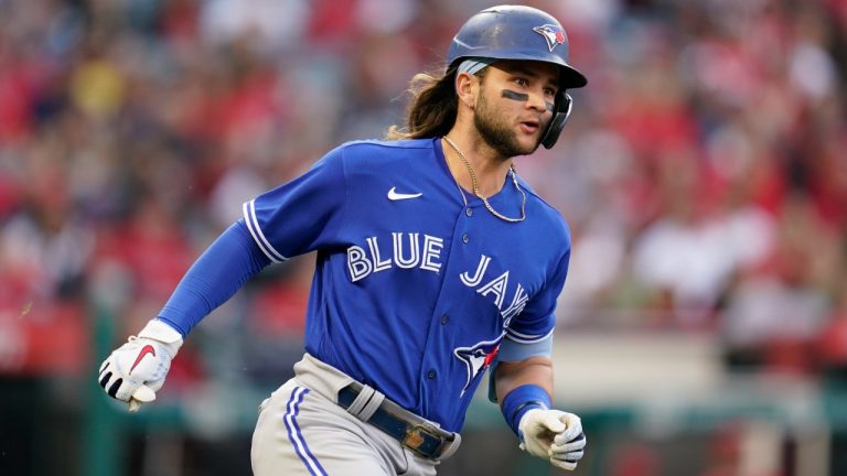 Toronto Blue Jays' Bo Bichette (11) runs to second base on a ground-rule double during the second inning of a baseball game. (Ashley Landis/AP)