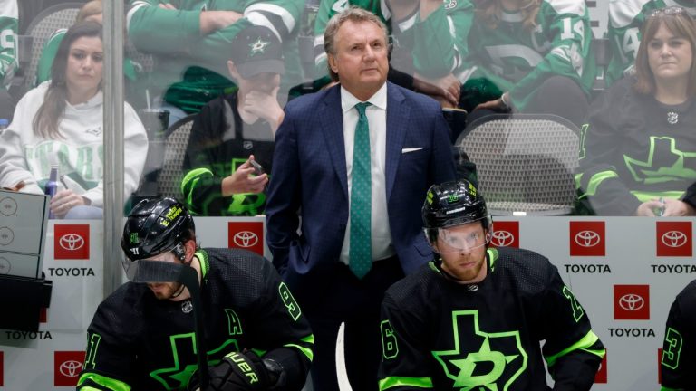 Dallas Stars head coach Rick Bowness, top center, center Tyler Seguin (91) and center Joe Pavelski (16) watch from the bench as they play the San Jose Sharks during the third period of an NHL hockey game in Dallas, Saturday, April 16, 2022. (Michael Ainsworth/AP)