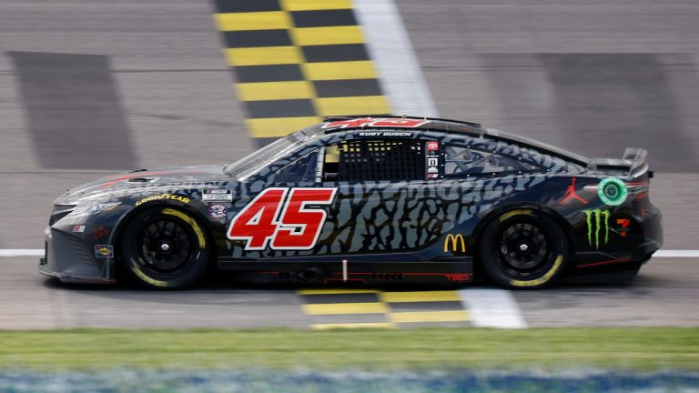 Kurt Busch (45) crosses the finish line to win a NASCAR Cup Series auto race at Kansas Speedway in Kansas City, Kan., Sunday, May 15, 2022. (Colin E. Braley/AP)