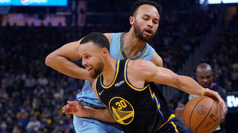 Warriors guard Stephen Curry (30) drives to the basket against Grizzlies forward Kyle Anderson during the first half of Game 3 of their NBA basketball Western Conference playoff semifinal in San Francisco on Saturday. (Jeff Chiu/AP)