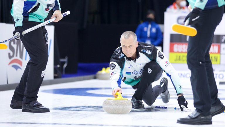 E.J. Harnden shoots a stone for Team Jacobs during the 2022 KIOTI Tractor Champions Cup on May 6, 2022, at the Olds Sportsplex in Olds, Alta. (Anil Mungal)