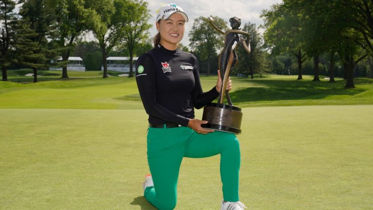 Minjee Lee, of Australia, poses with the trophy after winning the LPGA Cognizant Founders Cup golf tournament, Sunday, May 15, 2022, in Clifton, N.J. (Seth Wenig/AP)