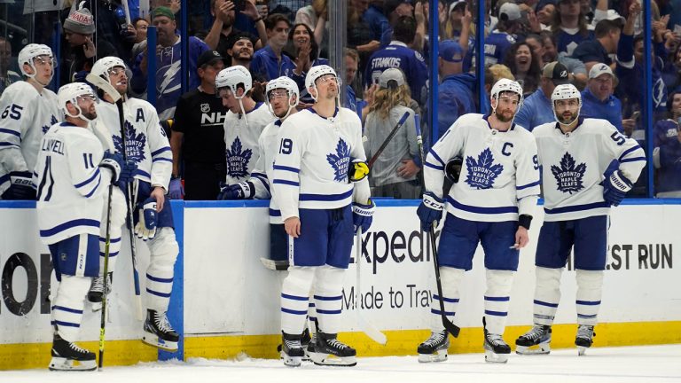 Members of the Toronto Maple Leafs ract after the Tampa Bay Lightning scored the game-winning goal during sudden-death overtime in Game 6 of an NHL hockey first-round playoff series. (Chris O'Meara/AP)