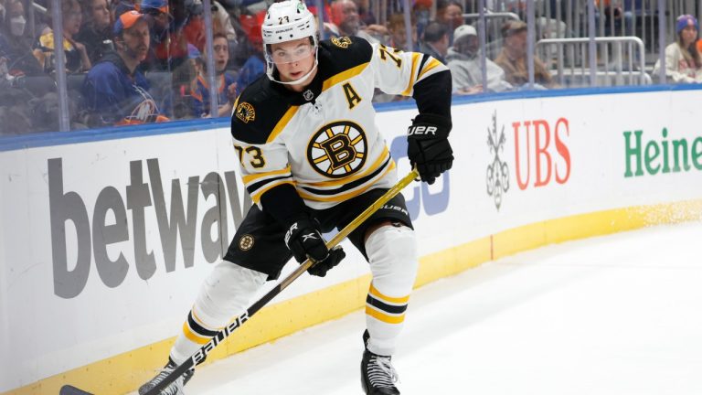 Boston Bruins defenseman Charlie McAvoy (73) skates behind the net during the third period of an NHL hockey game against the New York Islanders, Thursday, Dec. 16, 2021, in Elmont, N.Y. (Corey Sipkin/AP)