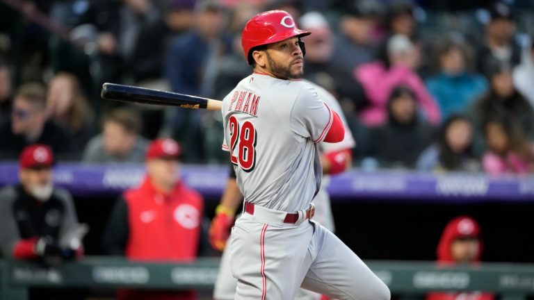 Cincinnati Reds' Tommy Pham watches his double off Colorado Rockies starting pitcher Antonio Senzatela during the fourth inning of a baseball game Friday, April 29, 2022, in Denver. (David Zalubowski/AP)