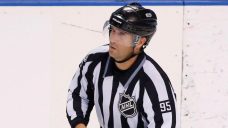 Linesman taken out by snow bucket during Bruins-Hurricanes game