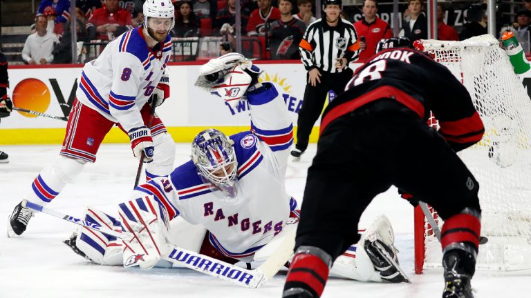 New York Rangers goaltender Igor Shesterkin (31) snares the shot of Carolina Hurricanes' Jordan Martinook (48) during the second period of Game 5 of an NHL hockey Stanley Cup second-round playoff series in Raleigh, N.C., Thursday, May 26, 2022. (Karl B DeBlaker/AP)