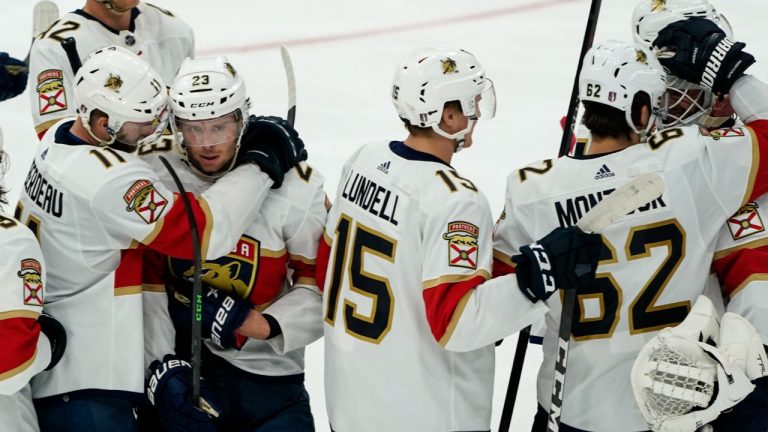 Florida Panthers left wing Jonathan Huberdeau (11) and center Carter Verhaeghe (23) celebrate after Game 6 in the first round of the NHL Stanley Cup hockey playoffs against the Washington Capitals, Friday, May 13, 2022, in Washington. (Alex Brandon/AP)