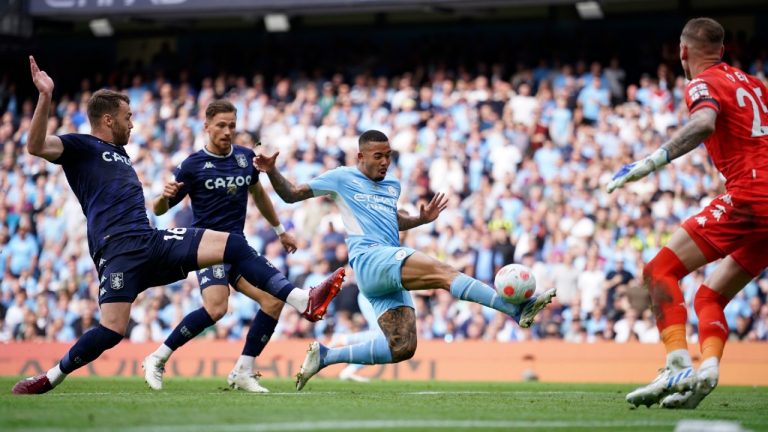 Aston Villa goalkeeper Robin Olsen, right, seen here facing Manchester City's Gabriel Jesus 
during their English Premier League soccer match in Manchester, England on Sunday, was assaulted by fans. (Dave Thompson/AP)