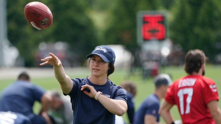 Amanda Ruller passes a football during an NFL practice on June 8, 2022, in Renton, Wash. (Ted S. Warren/AP)