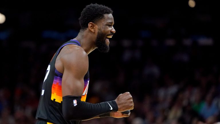 Phoenix Suns center Deandre Ayton reacts to making a basket against the New Orleans Pelicans during the first half of Game 5 of an NBA basketball first-round playoff series. (Matt York/AP)