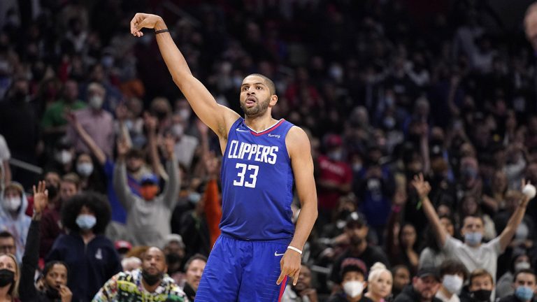 Los Angeles Clippers forward Nicolas Batum poses as he hits a three-point shot late in the second half of an NBA basketball game against the Denver Nuggets Tuesday, Jan. 11, 2022, in Los Angeles. The Clippers won 87-85. (Mark J. Terrill/AP)