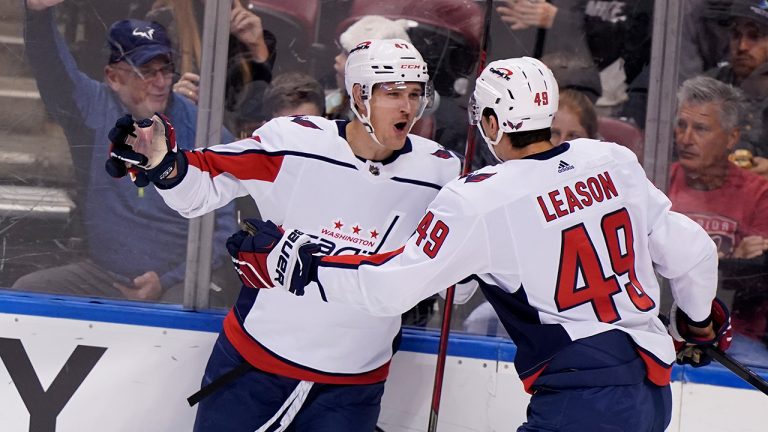 Washington Capitals left wing Beck Malenstyn, left, celebrates his goal with right wing Brett Leason (49) during the first period of an NHL hockey game against the Florida Panthers, Tuesday, Nov. 30, 2021, in Sunrise, Fla. (Wilfredo Lee/AP)