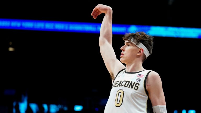 Wake Forest's Jake LaRavia (0) watches his three point shot in the first half of an NCAA college basketball game against Boston College during the Atlantic Coast Conference men's tournament, Wednesday, March 9, 2022, in New York. (AP Photo/John Minchillo)