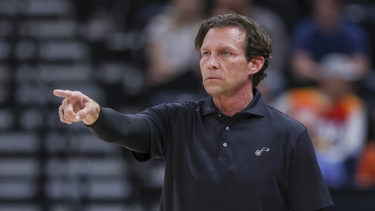 Quin Snyder gives instructions. (Rob Gray/AP)