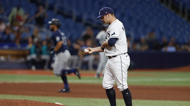 Tampa Bay Rays relief pitcher Andrew Kittredge waits as Seattle Mariners' Abraham Toro circles the bases after hitting a home run during the ninth inning of a baseball game. (Scott Audette/AP)