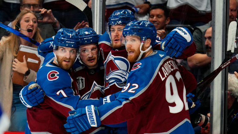 Colorado Avalanche right wing Valeri Nichushkin (13) celebrates a goal against the Tampa Bay Lightning with Devon Toews (7), Cale Makar (8) and Gabriel Landeskog (92) during the second period in Game 5 of the NHL hockey Stanley Cup Final. (Jack Dempsey/AP)