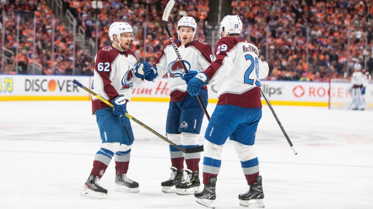 Colorado Avalanche's Artturi Lehkonen (62), Nathan MacKinnon (29) and Cale Makar (8) celebrate a goal against the Edmonton Oilers during first period NHL conference finals action in Edmonton on Monday, June 6, 2022. (Jason Franson/CP)