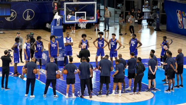 Participants in the 2022 NBA basketball Draft Combine listen to a coach Wednesday, May 18, 2022, at the Wintrust Arena in Chicago. (Charles Rex Arbogast/AP)