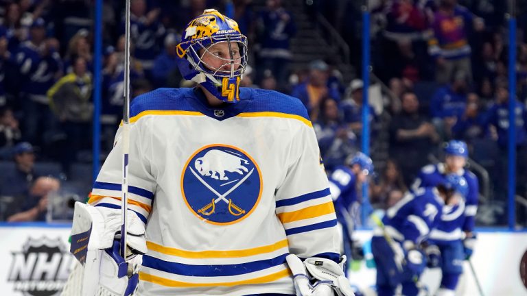 Buffalo Sabres goaltender Craig Anderson (41) reacts as the Tampa Bay Lightning celebrate a goal by Brandon Hagel during the second period of an NHL hockey game Sunday, April 10, 2022, in Tampa, Fla. (Chris O'Meara/AP)