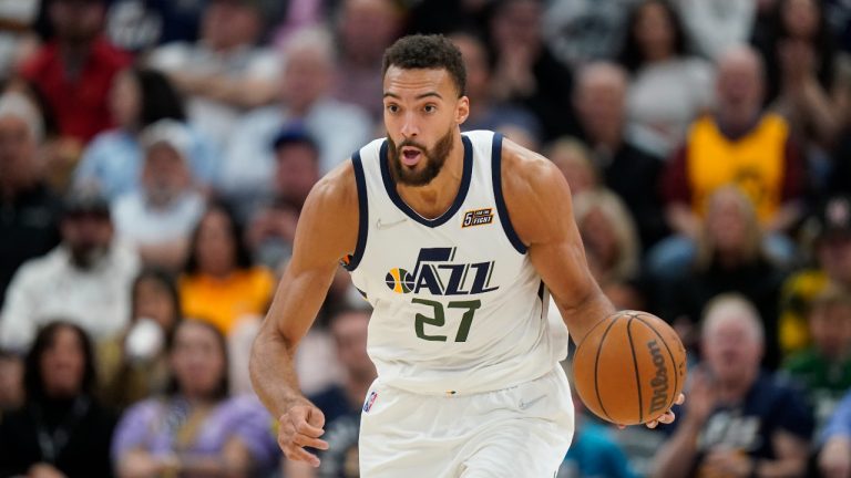 Utah Jazz center Rudy Gobert brings the ball up during the second half of the team's NBA basketball game against the Oklahoma City Thunder. (Rick Bowmer/AP)