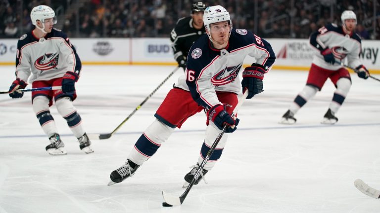 Columbus Blue Jackets center Jack Roslovic (96) controls the puck during the third period of an NHL hockey game against the Los Angeles Kings Saturday, April 16, 2022, in Los Angeles. (Ashley Landis/AP)