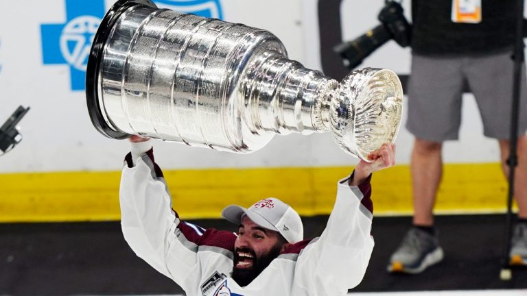 Colorado Avalanche forward Nazem Kadri lifts the Stanley Cup after the team defeated the Tampa Bay Lightning 2-1 in Game 6 of the NHL hockey Stanley Cup Finals on Sunday, June 26, 2022, in Tampa, Fla. (John Bazemore/AP Photo)