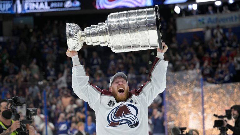 Colorado Avalanche left wing Gabriel Landeskog lifts the Stanley Cup after the team defeated the Tampa Bay Lightning in Game 6 of the NHL hockey Stanley Cup Finals on Sunday, June 26, 2022, in Tampa, Fla. (Phelan Ebenhack/AP Photo)